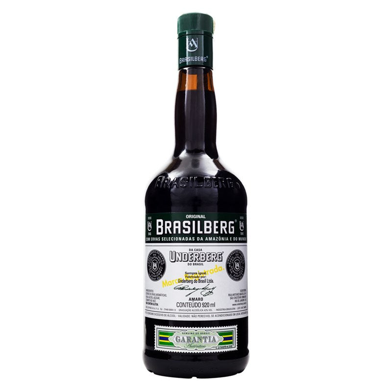 Underberg Original Brasilberg aperitif bottle, 920ml, featuring a colorful label and clear glass design.